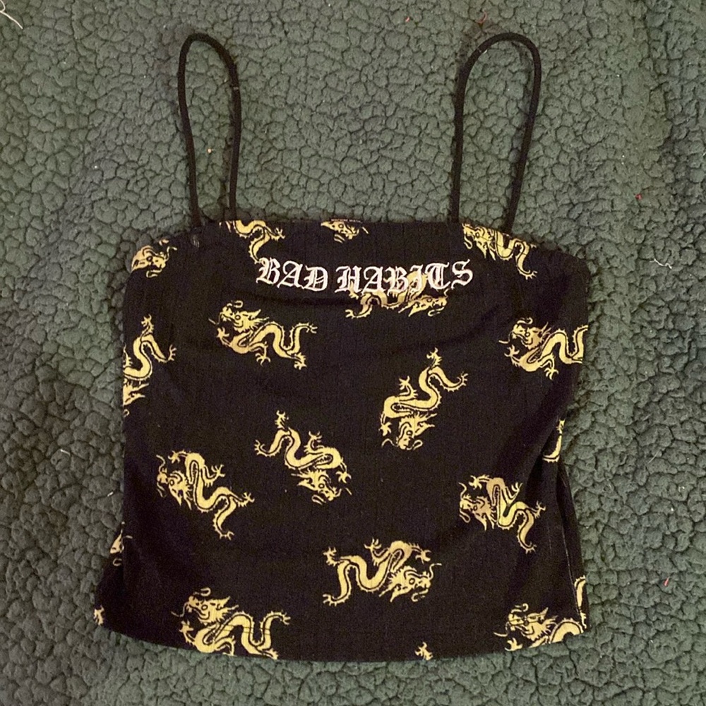 Xs/ crop top green with dragons and the writing says “bad habits”